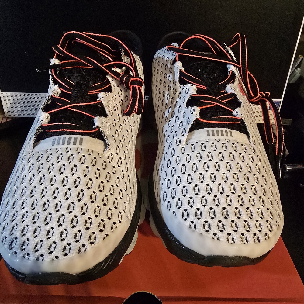 Under Armour Men"s  White and Black Athletic Shoes with Red Accents